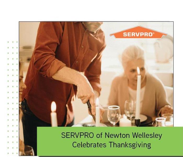Family enjoying Thanksgiving with green box and orange SERVPRO logo 