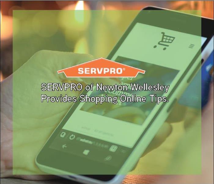 Cell phone in background with green box overlay with SERVPRO logo 