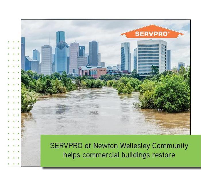 Commercial building with green text overlay and SERVPRO logo